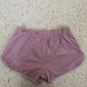 Pink lululemon reversible running shorts size 10